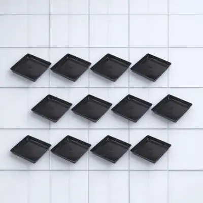 12 Pcs Flower Pot Bottom Mat Plant Pots Indoor Potted and Pans Saucer Plastic Plate Square Plates Tray 
12 Pcs Flower Pot Bottom Mat Plant Pots Indoor Potted and Pans Saucer Plastic Plate Square Plates Tray
