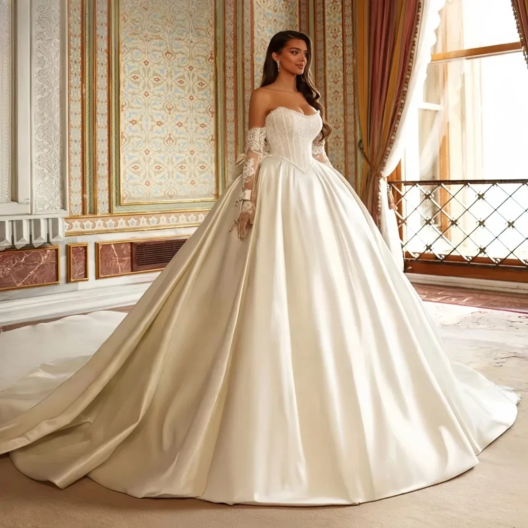 Customized Elegant Scoop Neck Long Sleeve Beading Ball Gown Wedding Dress Gorgeous Satin Court Train Bridal Gown Train
Customized Elegant Scoop Neck Long Sleeve Beading Ball Gown Wedding Dress Gorgeous Satin Court Train Bridal Gown Train