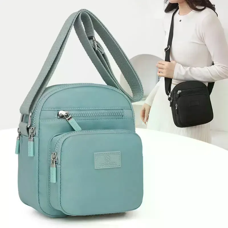 Women's Tiny Crossbody Tote using Durable Nylon Material; Adorable Stitching Mobile Phone Purse; Versatile Girls' Messenger Bag
Women's Tiny Crossbody Tote using Durable Nylon Material; Adorable Stitching Mobile Phone Purse; Versatile Girls' Messenger Bag