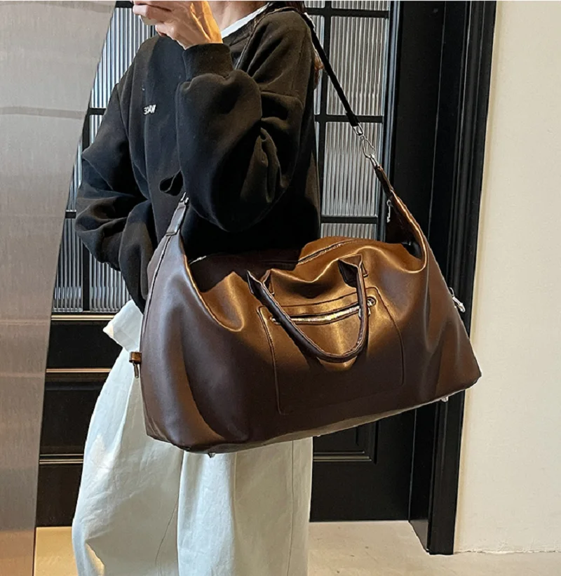 New Korean Fashion High Quality Leather Travel Handbag Men Women's Large Capacity Business Totes Shoulder Bags Shopping Bag
New Korean Fashion High Quality Leather Travel Handbag Men Women's Large Capacity Business Totes Shoulder Bags Shopping Bag