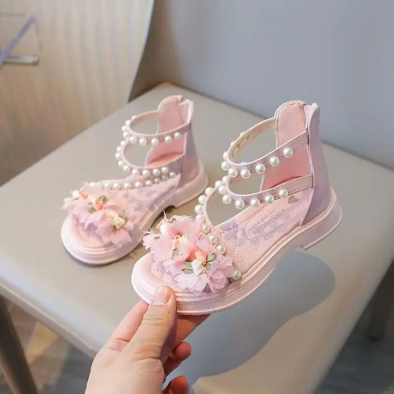 Детские летние новые сандалии с цветочным декором и бусинами для девочек, с мягкой подошвой, нескользящие, с открытым носком, модные, универсальные, с закрытой пяткой, в стиле принцесс
Детские летние новые сандалии с цветочным декором и бусинами для девочек, с мягкой подошвой, нескользящие, с открытым носком, модные, универсальные, с закрытой пяткой, в стиле принцесс