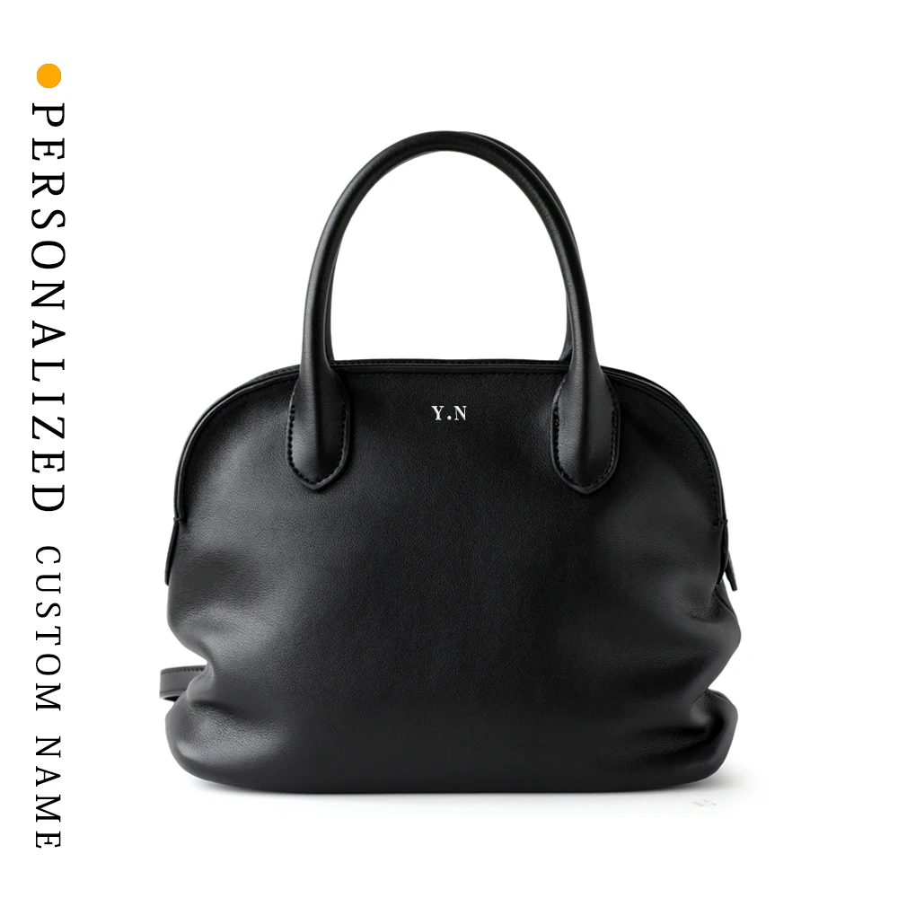 2025 French simple and high-end commuter bowling handbag niche design two-layer cowhide women's shell bag free gold hot stamping
2025 French simple and high-end commuter bowling handbag niche design two-layer cowhide women's shell bag free gold hot stamping
