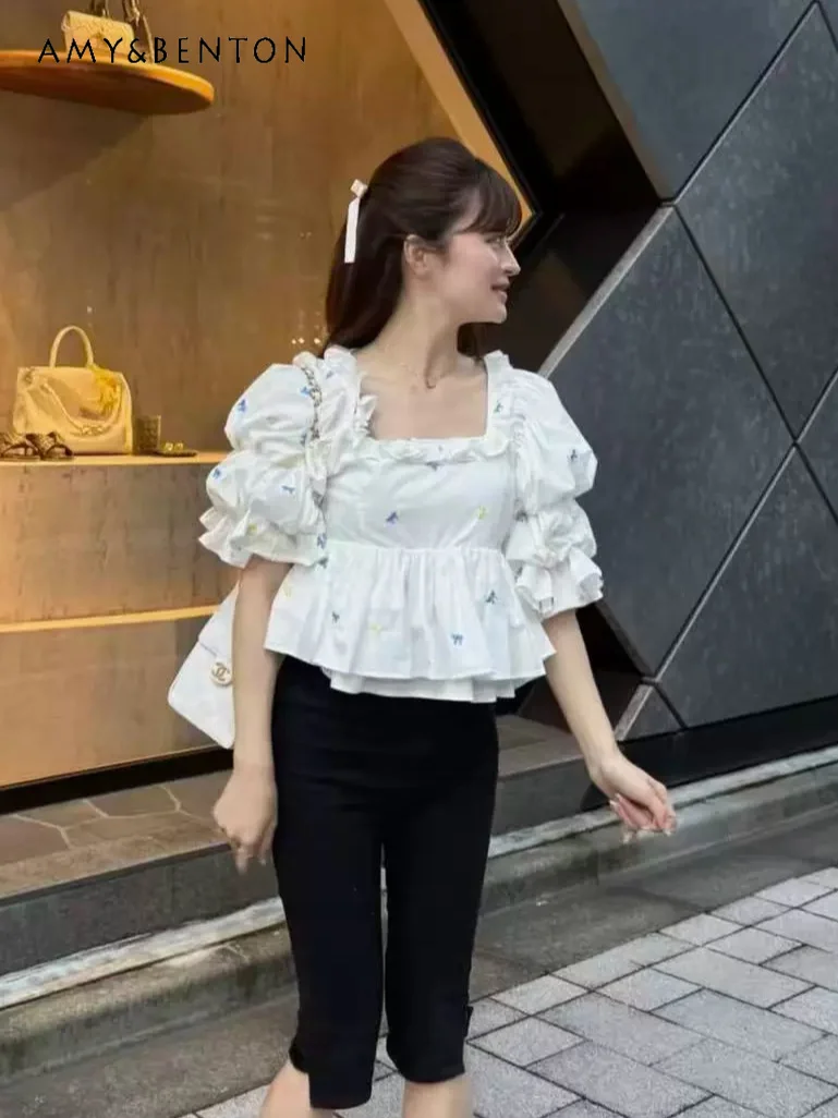 Temperament Chiffon Shirt French Ruffle Edge Square Neck Embroidered Bubble Sleeve Shirt Sweet Spice Girl One-word Shoulder Top
Temperament Chiffon Shirt French Ruffle Edge Square Neck Embroidered Bubble Sleeve Shirt Sweet Spice Girl One-word Shoulder Top