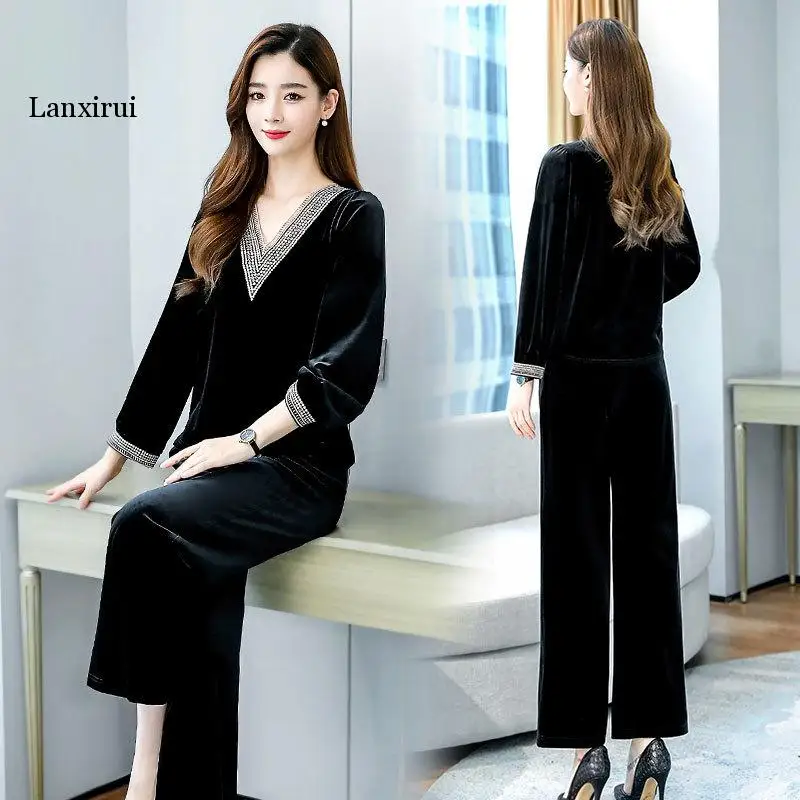 High Quality New Women Two Piece Sets Long Sleeve V Neck Beading Top Wide Leg Pants Female Fashion 2 pieces Set Suits Style
High Quality New Women Two Piece Sets Long Sleeve V Neck Beading Top Wide Leg Pants Female Fashion 2 pieces Set Suits Style