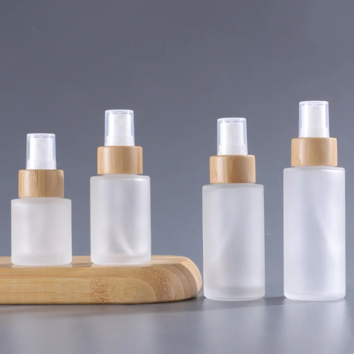 Cosmetic Glass Cosmetic Bottle Clear Frosted Flat Shoulder Glass Spray Bottle Mist with Bamboo Lid for Hair Makeup Containers
Cosmetic Glass Cosmetic Bottle Clear Frosted Flat Shoulder Glass Spray Bottle Mist with Bamboo Lid for Hair Makeup Containers