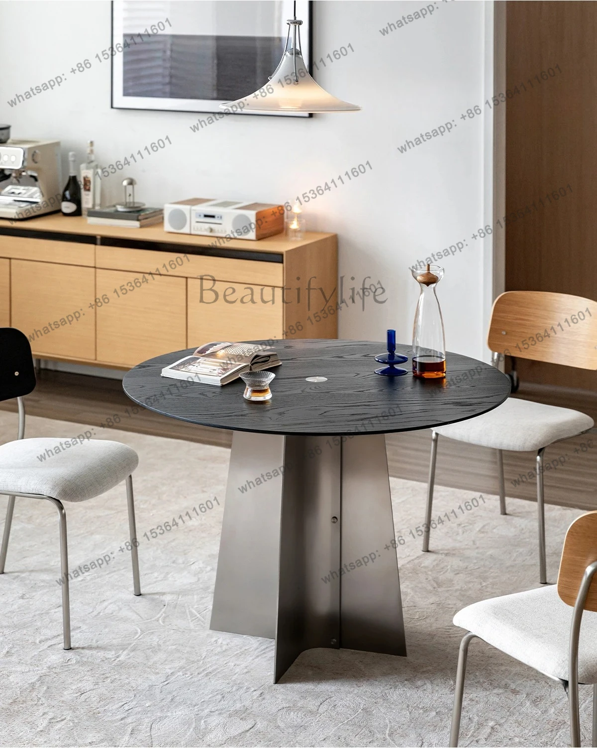 Modern simple round table solid wood dining table small apartment household black retro table
Modern simple round table solid wood dining table small apartment household black retro table