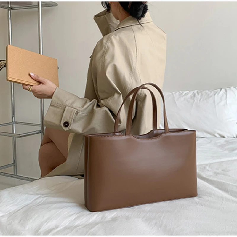 Korean Minimalist Solid Color Handbag For Work Commuting Large Capacity Tote Bag Fashion High-end Design Women's Shoulder Bag
Korean Minimalist Solid Color Handbag For Work Commuting Large Capacity Tote Bag Fashion High-end Design Women's Shoulder Bag