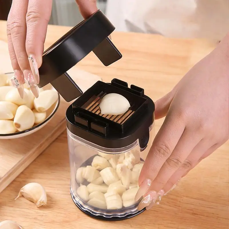 Garlic Press Slicer Manual Garlic Presser Slicer With Storage Container Kitchen Slicing Tool Multifunctional With Anti-Slip
Garlic Press Slicer Manual Garlic Presser Slicer With Storage Container Kitchen Slicing Tool Multifunctional With Anti-Slip