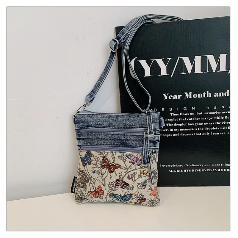 Джинсовая сумка через плечо, дизайн с цветовыми блоками, уникальное узорчатое оформление, сумка-кроссбоди с множеством карманов
Джинсовая сумка через плечо, дизайн с цветовыми блоками, уникальное узорчатое оформление, сумка-кроссбоди с множеством карманов