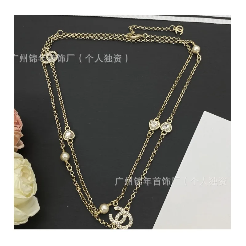 Double-layer Love Double Necklace Light Luxury Pearl Diamond Jewelry Temperament Neck Chain High-end Sense Versatile Stacked Swe
Double-layer Love Double Necklace Light Luxury Pearl Diamond Jewelry Temperament Neck Chain High-end Sense Versatile Stacked Swe