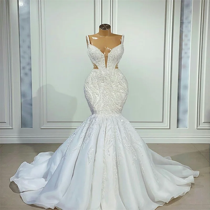 Crystal Spring Wedding Dresses 2025 Pearls Appliqued Lace Straps Organza Custom Made Chic Bridal Gowns Vestidos Noiva
Crystal Spring Wedding Dresses 2025 Pearls Appliqued Lace Straps Organza Custom Made Chic Bridal Gowns Vestidos Noiva