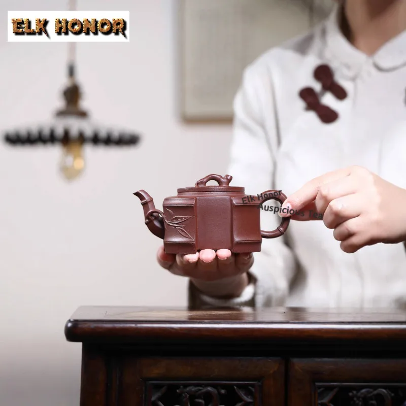 Чайник из бамбука ручной росписи, 240 мл, изысканный чайник из исинской фиолетовой глины, квадратный чайник ручной работы из необработанной глины XXX, чайный набор из чайной глины цзяшы
Чайник из бамбука ручной росписи, 240 мл, изысканный чайник из исинской фиолетовой глины, квадратный чайник ручной работы из необработанной глины XXX, чайный набор из чайной глины цзяшы