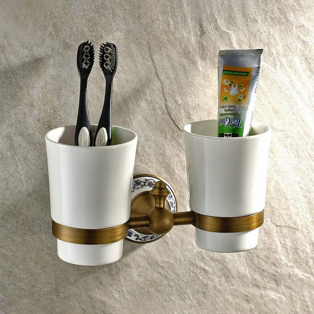 Antique Brass Wall Mounted Dual Cup Holder Toothbrush Holder W/ Two Ceramic Cups For Bathroom Accessories zba408
Antique Brass Wall Mounted Dual Cup Holder Toothbrush Holder W/ Two Ceramic Cups For Bathroom Accessories zba408