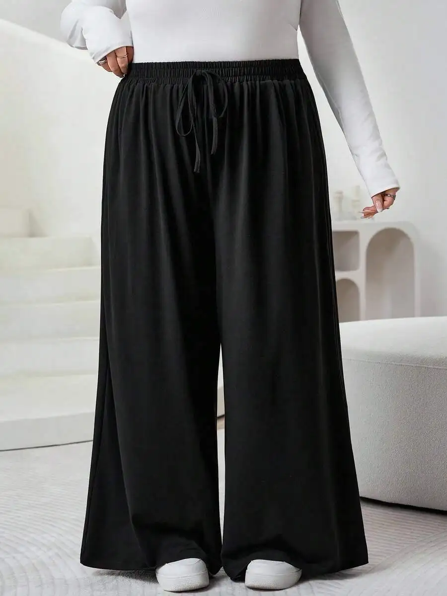 Black Plus Size Wide Leg Trousers With Elastic Waist And Drawstring Closure For Women
Black Plus Size Wide Leg Trousers With Elastic Waist And Drawstring Closure For Women