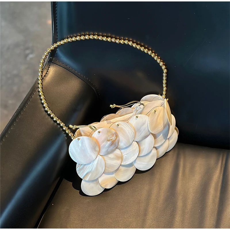 Дизайнерская сумка с блестками в виде ракушки феи, роскошная тканая сумка на плечо ручной работы с цепочкой, женский вечерний клатч для пляжных путешествий и отпуска 
Дизайнерская сумка с блестками в виде ракушки феи, роскошная тканая сумка на плечо ручной работы с цепочкой, женский вечерний клатч для пляжных путешествий и отпуска