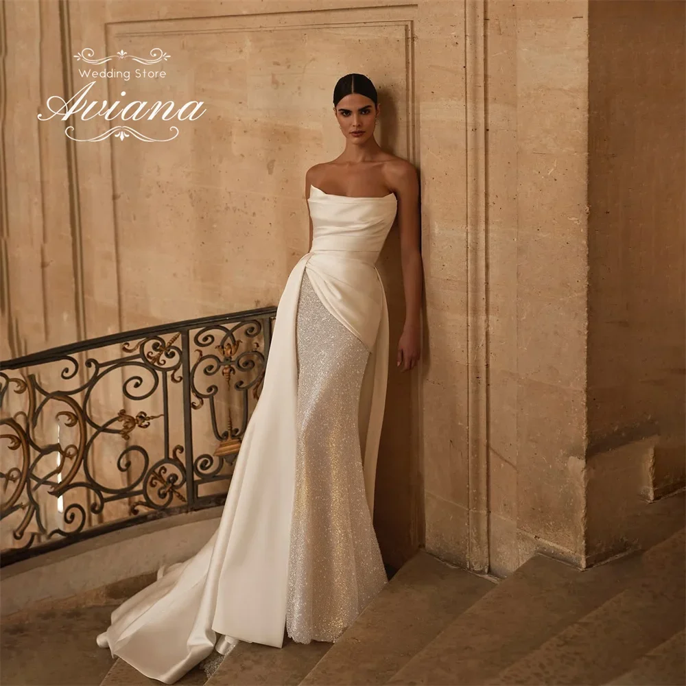 Aviana индивидуальное свадебное платье без бретелек с вырезом «лодочка» без рукавов со шлейфом длиной до пола, элегантное сверкающее блестящее пудровое платье
Aviana индивидуальное свадебное платье без бретелек с вырезом «лодочка» без рукавов со шлейфом длиной до пола, элегантное сверкающее блестящее пудровое платье