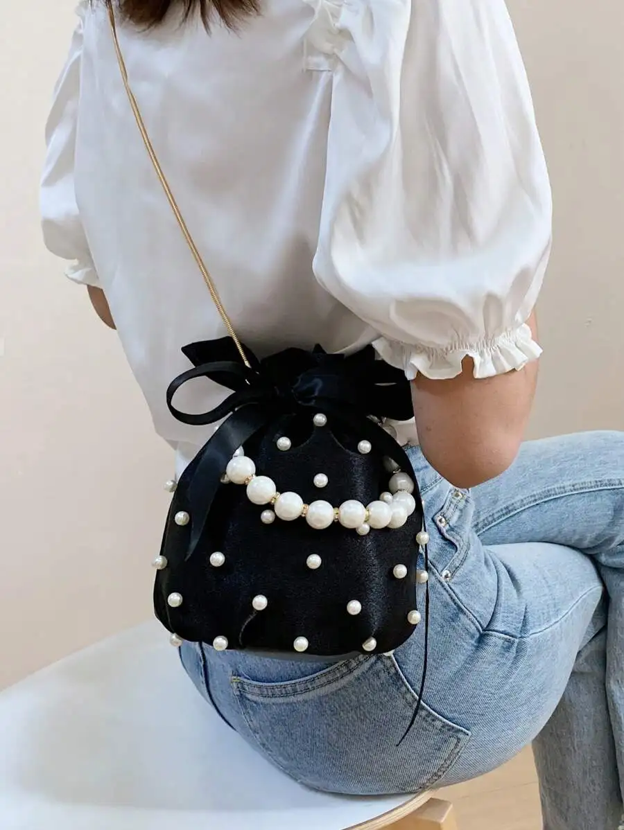 Luxury Black Velvet Drawstring Bag With Pearl Embellishments And Satin Bow For Women
Luxury Black Velvet Drawstring Bag With Pearl Embellishments And Satin Bow For Women
