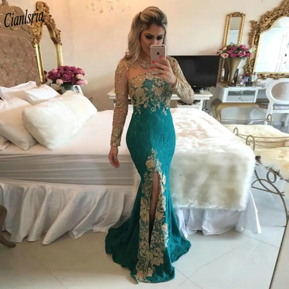 Vintage Long Sleeve Side Split Dubai Arabic Mermaid Evening Dress Gold Appliques Lace Illusion Back Formal Evening Party Gown
Vintage Long Sleeve Side Split Dubai Arabic Mermaid Evening Dress Gold Appliques Lace Illusion Back Formal Evening Party Gown