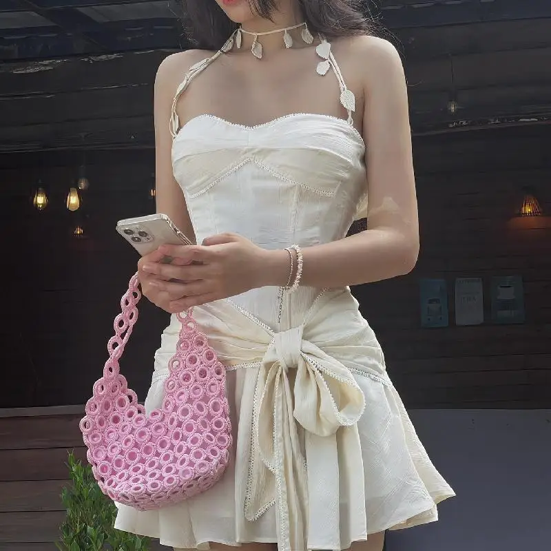 2026 Summer New Fashion Pure Color Bow Tie Pleated Hip-hugging Dress French Style Elegance Pendant Design Halter Dress for Women
2026 Summer New Fashion Pure Color Bow Tie Pleated Hip-hugging Dress French Style Elegance Pendant Design Halter Dress for Women