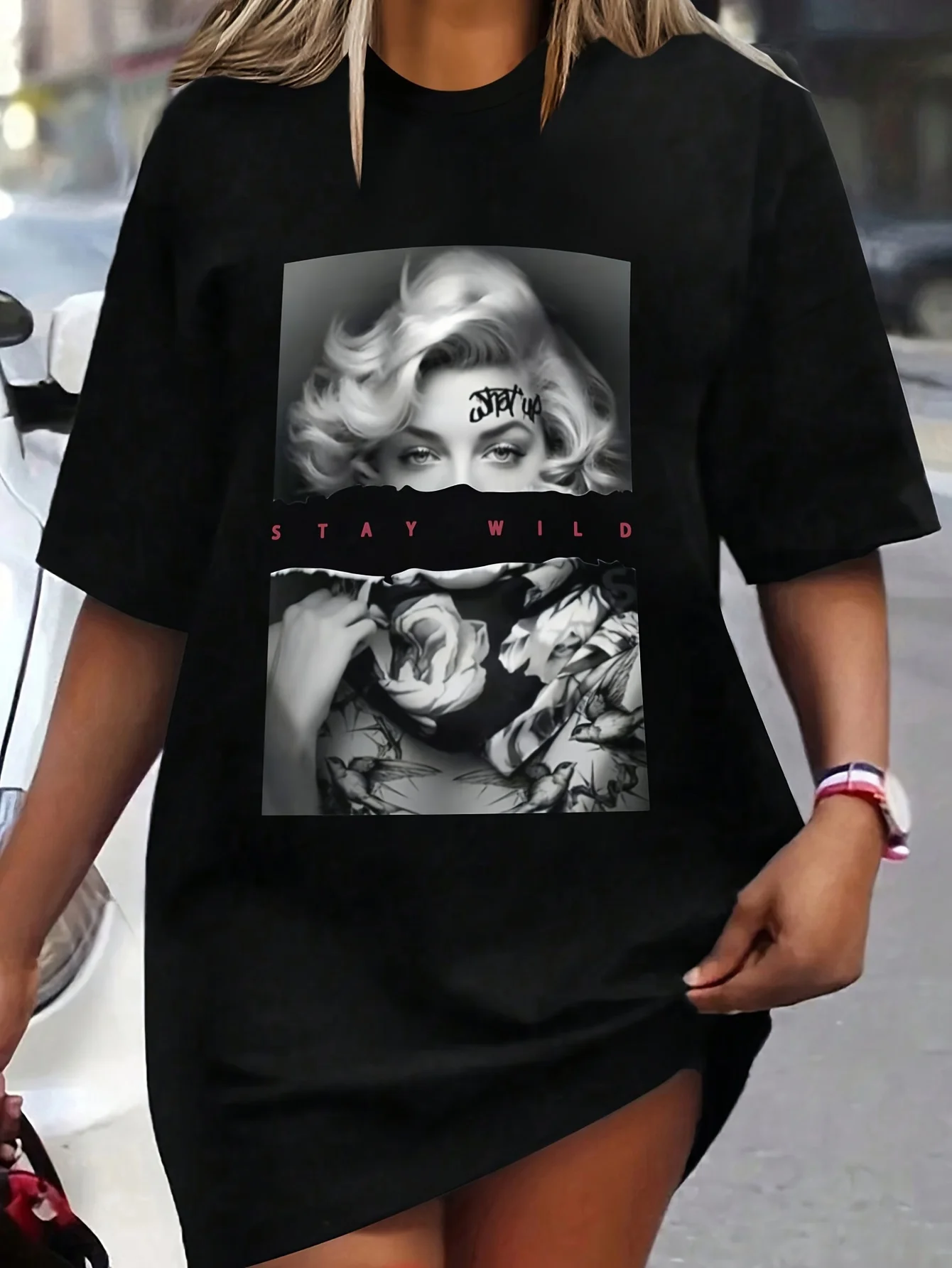 Plus - Size Black Round Neck T - Shirt with Iconic Figure, Floral Motifs and 'STAY WILD' Quote: Retro - Edgy and Inspiring
Plus - Size Black Round Neck T - Shirt with Iconic Figure, Floral Motifs and 'STAY WILD' Quote: Retro - Edgy and Inspiring