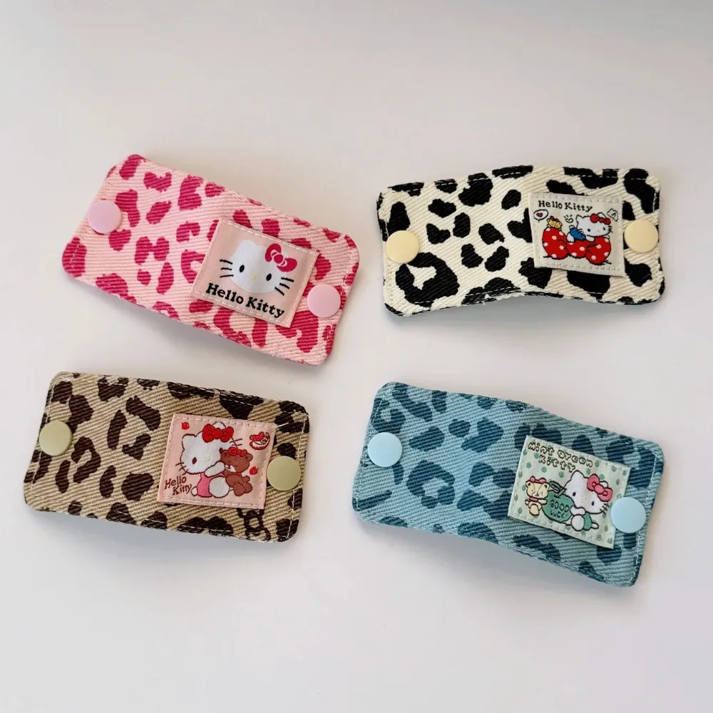 Sanrio Hello Kitty Leopard Print Denim Fabric Data Cable Storage Clip Charging Cable Storage Bag Brush Storage Gifts for Girl
Sanrio Hello Kitty Leopard Print Denim Fabric Data Cable Storage Clip Charging Cable Storage Bag Brush Storage Gifts for Girl