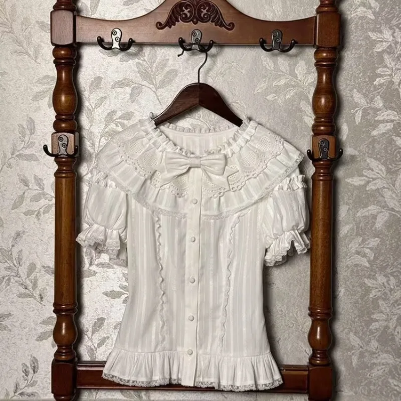 Винтажные милые рубашки в стиле Лолиты, женские рубашки Kawaii Puff с короткими рукавами и рюшами и бантом, блузки для девочек, готические тонкие топы Y2k, панк Blusas Mujer
Винтажные милые рубашки в стиле Лолиты, женские рубашки Kawaii Puff с короткими рукавами и рюшами и бантом, блузки для девочек, готические тонкие топы Y2k, панк Blusas Mujer