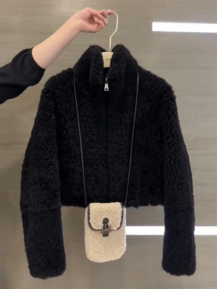 Модная утепленная куртка из овечьего меха для женщин, повседневное осенне-зимнее пальто с воротником-стойкой, маленький размер, трендовая верхняя одежда
Модная утепленная куртка из овечьего меха для женщин, повседневное осенне-зимнее пальто с воротником-стойкой, маленький размер, трендовая верхняя одежда
