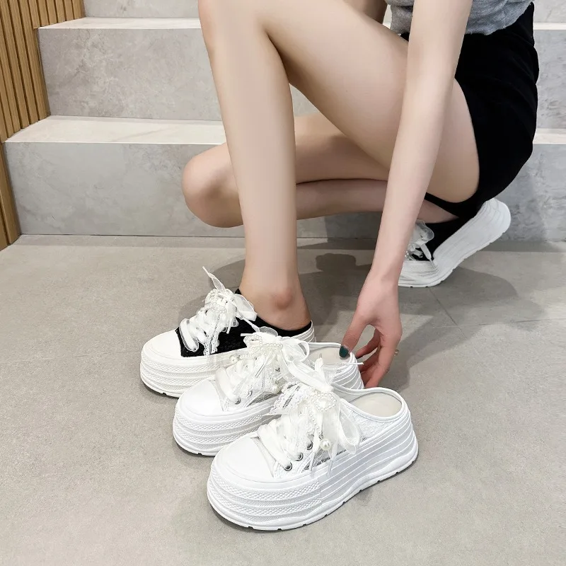 Women's Lace Mesh Pearl Bow Slide Sneakers 2026 Summer Round Toe Thick Sole Breathable Casual Mule Platform Shoes For Ladies
Women's Lace Mesh Pearl Bow Slide Sneakers 2026 Summer Round Toe Thick Sole Breathable Casual Mule Platform Shoes For Ladies