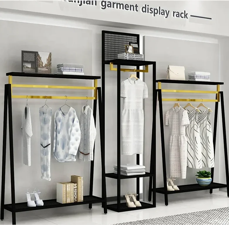 Clothes store display shelf floor type shelf black gold combination of men's and women's clothing store display shelf
Clothes store display shelf floor type shelf black gold combination of men's and women's clothing store display shelf