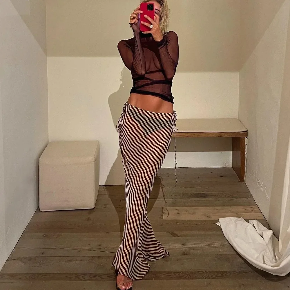 Women Summer Chiffon Holiday Skirt 2026 Low Waist Lace Up Long Sheer Cover Up Skirt Sexy See Through Striped Beach Skirts
Women Summer Chiffon Holiday Skirt 2026 Low Waist Lace Up Long Sheer Cover Up Skirt Sexy See Through Striped Beach Skirts