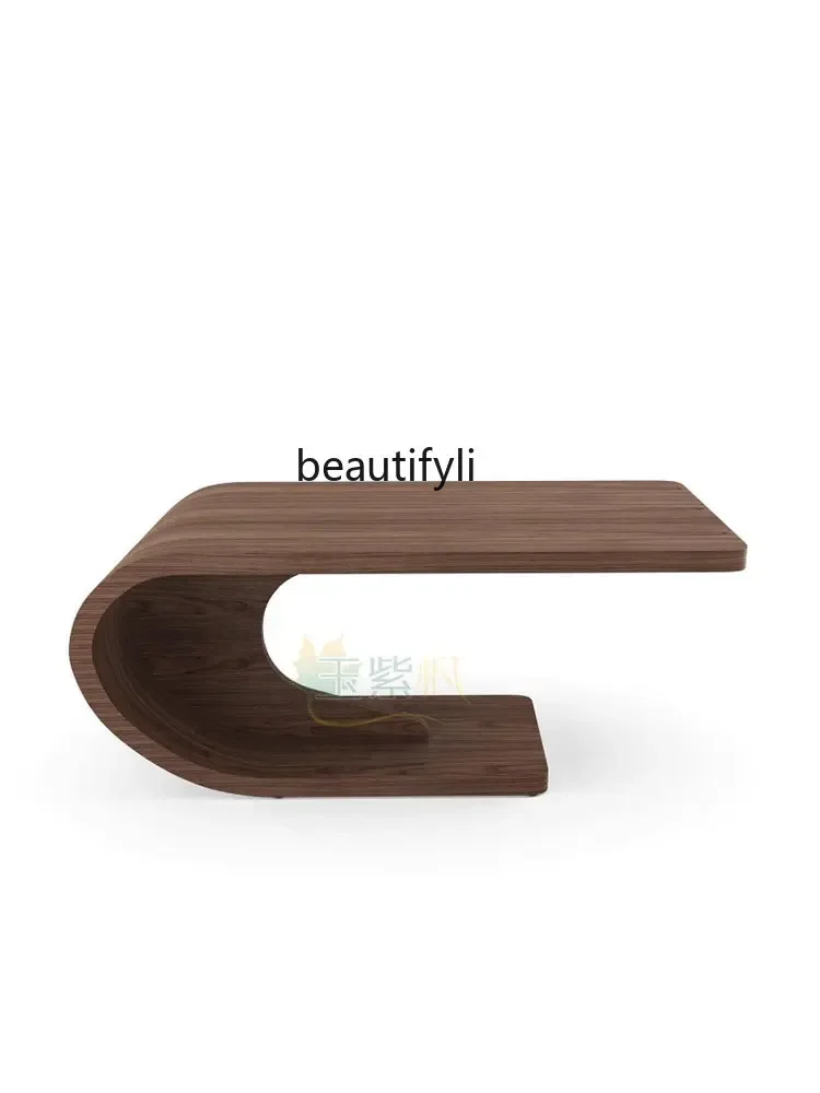 Nordic creative walnut coffee table Italian minimalist special-shaped coffee table living room simple modern tea table
Nordic creative walnut coffee table Italian minimalist special-shaped coffee table living room simple modern tea table