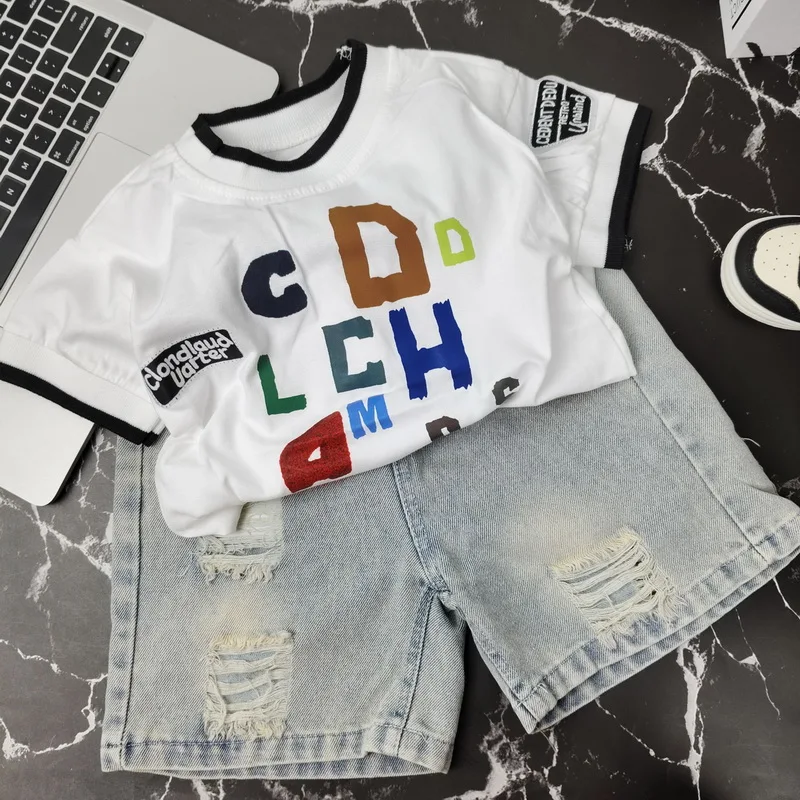Boys Summer Clothes Toddler T Shirt+Denim Shorts 2Piece Set Cute Letter Printed Fashion Kids Suit 2026 Children's Costume 2-8Yrs
Boys Summer Clothes Toddler T Shirt+Denim Shorts 2Piece Set Cute Letter Printed Fashion Kids Suit 2026 Children's Costume 2-8Yrs
