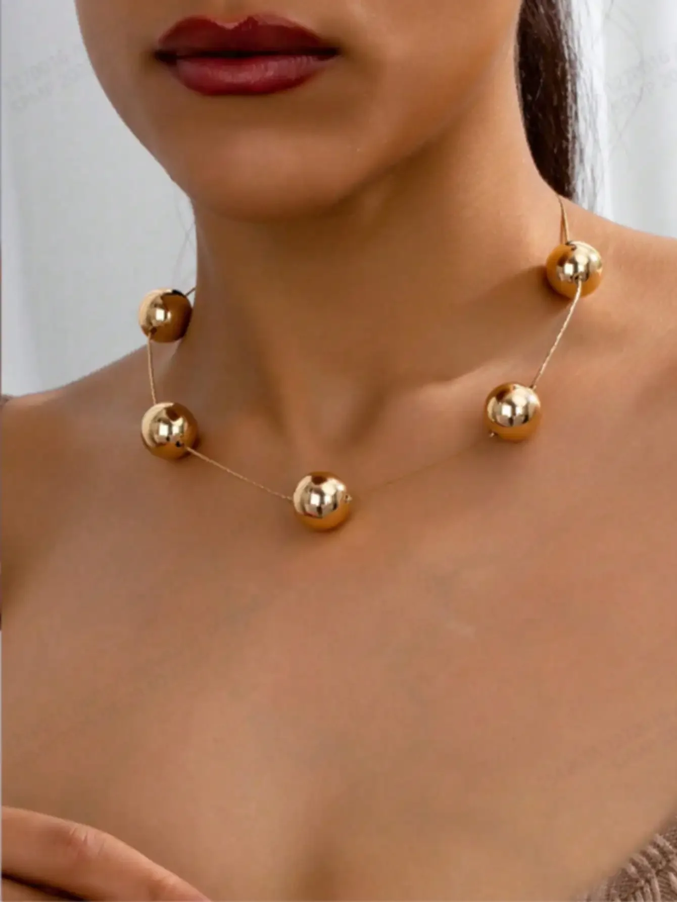 Minimalist Gold-Tone Metal Ball Chain Necklace for Women
Minimalist Gold-Tone Metal Ball Chain Necklace for Women