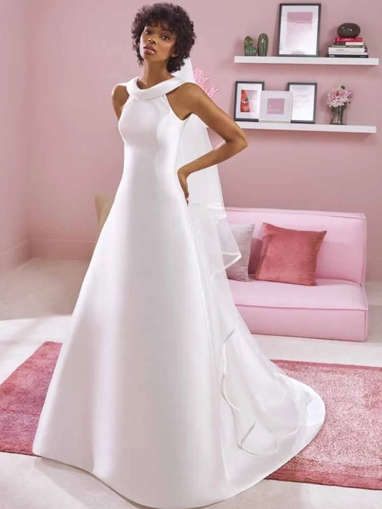 Простые церковные свадебные платья, атласные платья трапециевидной формы для свадебной вечеринки, белые женские платья с лямкой на шее и открытой спиной на молнии, тренд 2025
Простые церковные свадебные платья, атласные платья трапециевидной формы для свадебной вечеринки, белые женские платья с лямкой на шее и открытой спиной на молнии, тренд 2025
