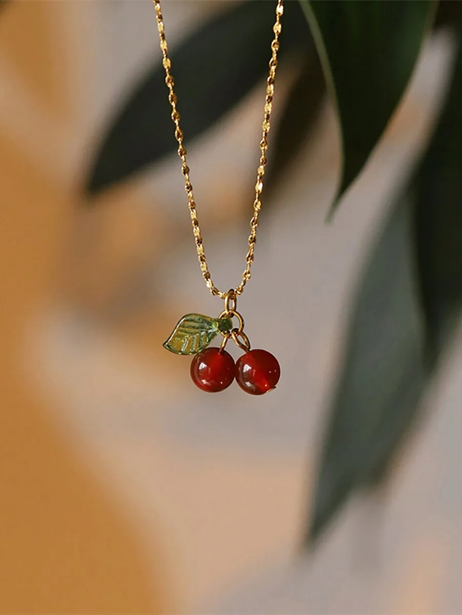 Cherry Fruit Pendant Necklace With Red Agate And Green Leaf Charm
Cherry Fruit Pendant Necklace With Red Agate And Green Leaf Charm