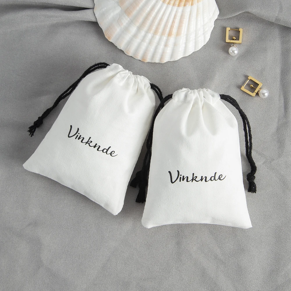 100pcs White Cotton Jewelry Pouches Drawstring Black Rope Gift Bags Bar Mitzvah Xmas Wedding Candy Ring Earrings Packaging Bag
100pcs White Cotton Jewelry Pouches Drawstring Black Rope Gift Bags Bar Mitzvah Xmas Wedding Candy Ring Earrings Packaging Bag