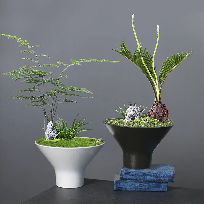 Creative bonsai flower pot small ceramic DIY micro landscape design pot simple and elegant succulent flower pot
Creative bonsai flower pot small ceramic DIY micro landscape design pot simple and elegant succulent flower pot