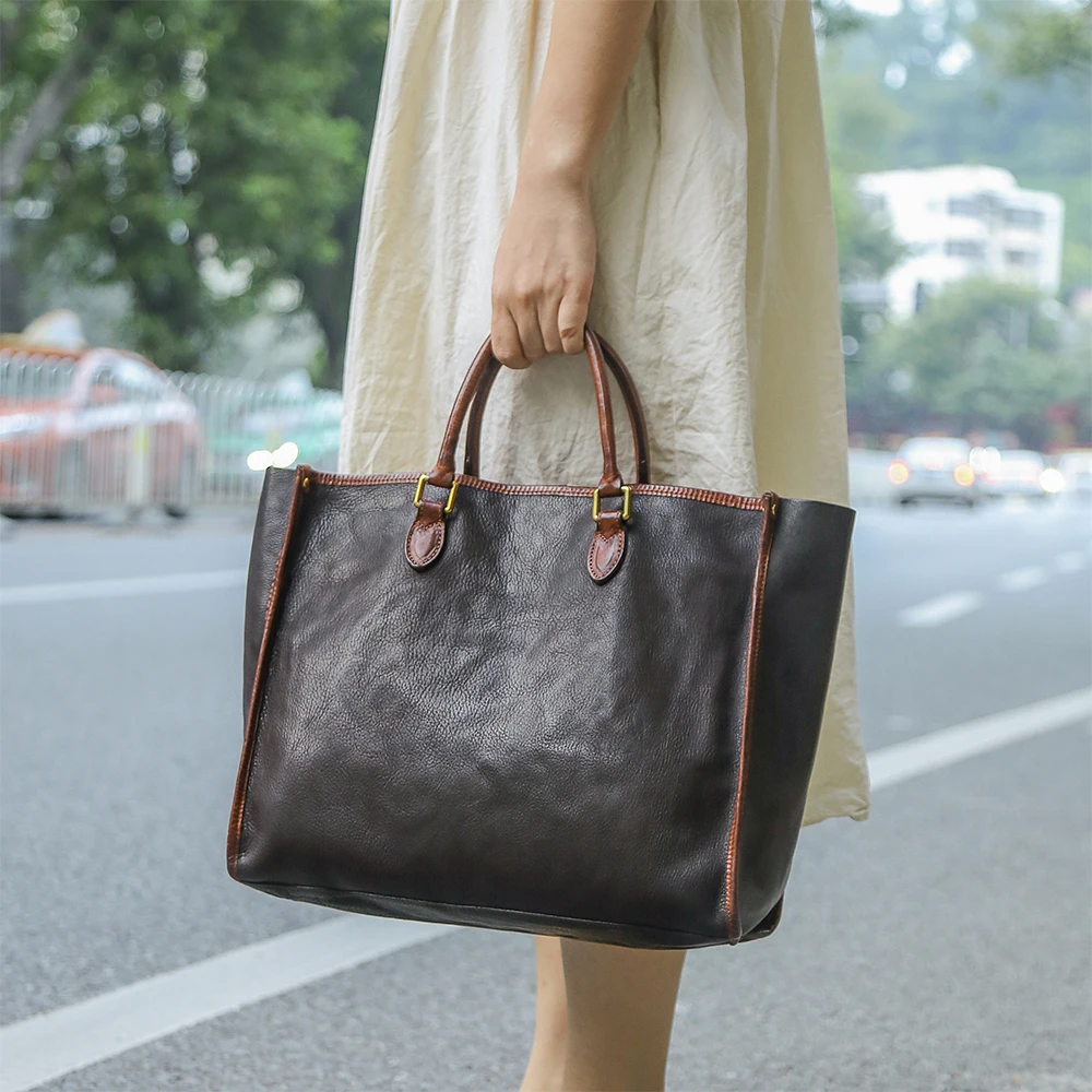 Top leather women's large capacity tote bag retro niche design crossbody bag vegetable tanned leather versatile shoulder bag
Top leather women's large capacity tote bag retro niche design crossbody bag vegetable tanned leather versatile shoulder bag