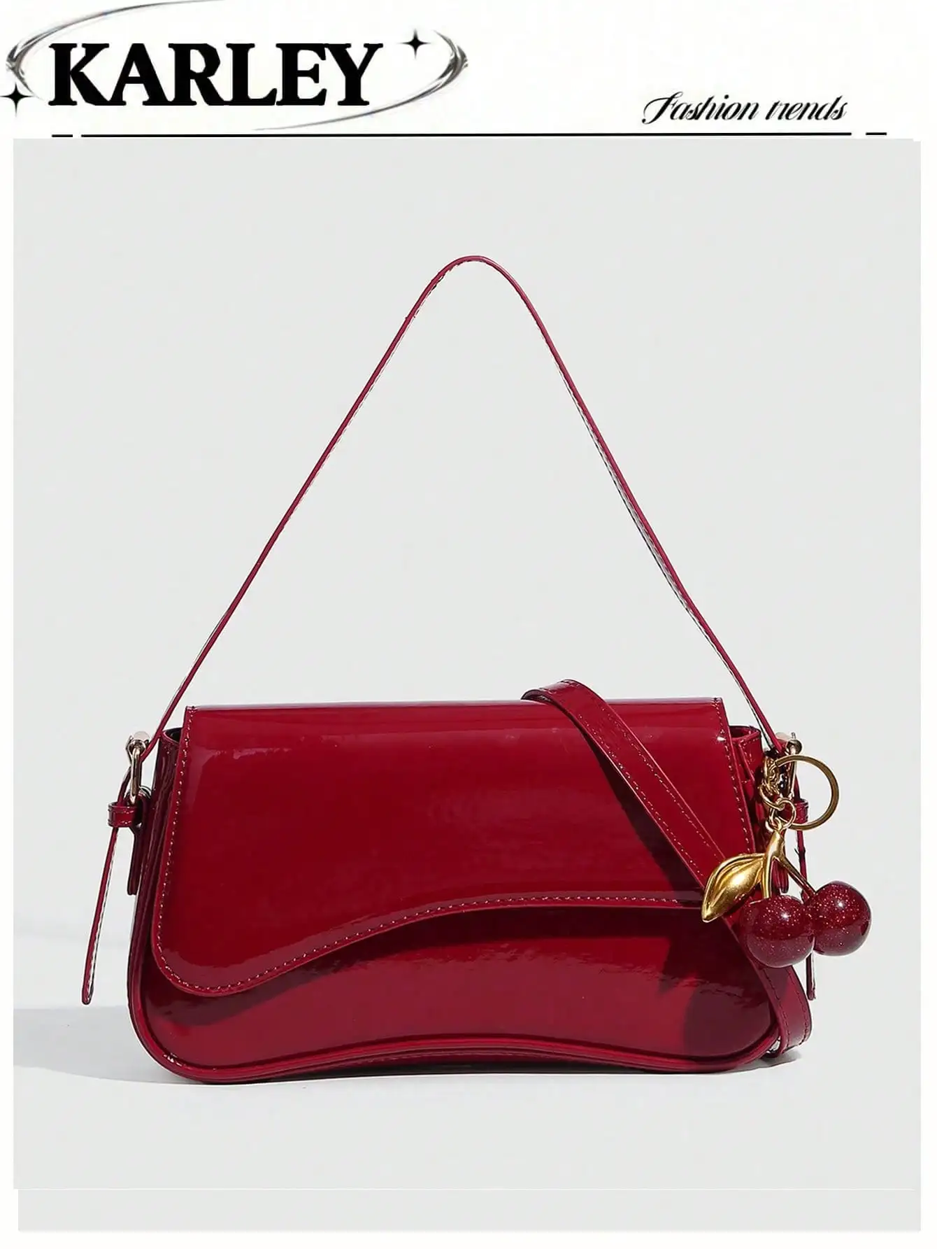 Burgundy Patent Leather Flap Shoulder Bag with Cherry Charm Decor
Burgundy Patent Leather Flap Shoulder Bag with Cherry Charm Decor