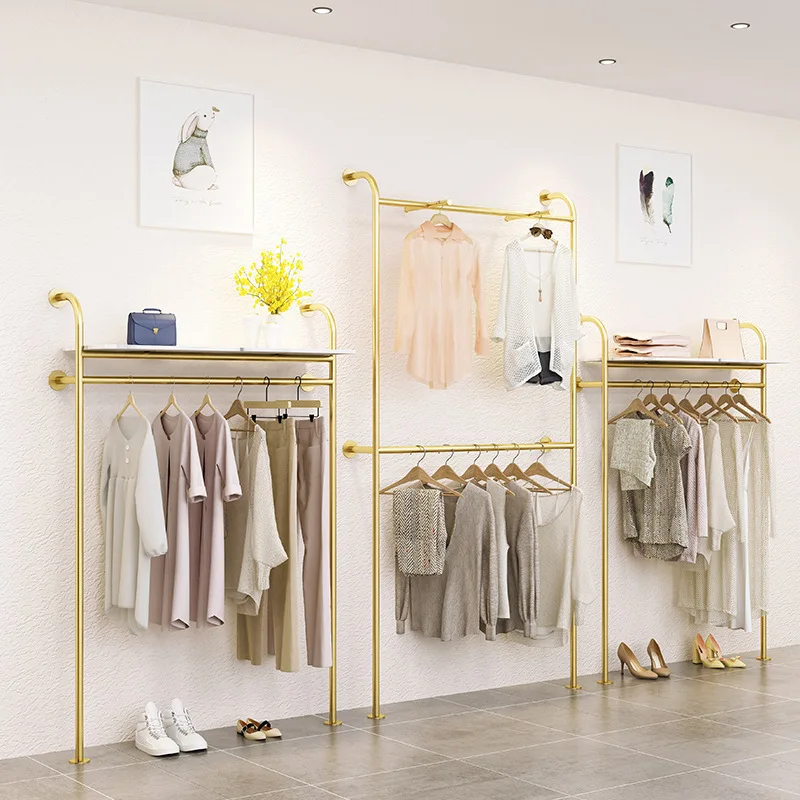 Clothing store display rack Women's clothing store Wall-mounted clothing store Gold display Double-layer display Hanger
Clothing store display rack Women's clothing store Wall-mounted clothing store Gold display Double-layer display Hanger