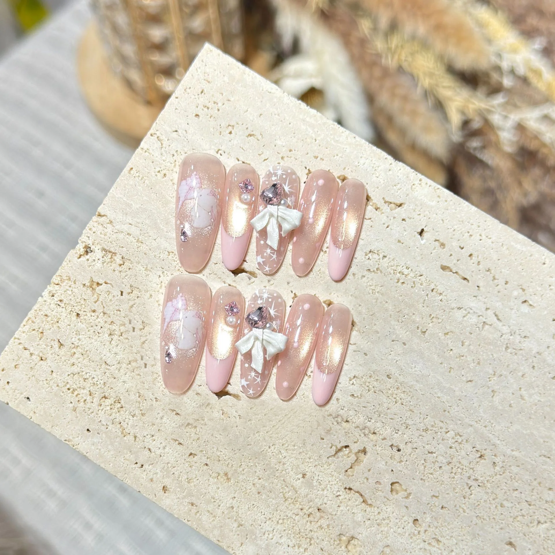 10pcs Nude Pink Cat Eye Handmade Nails 3D White Bow Rhinestone Star Cute Bear Fake Nail Medium Oval False Nail for Women&Girl
10pcs Nude Pink Cat Eye Handmade Nails 3D White Bow Rhinestone Star Cute Bear Fake Nail Medium Oval False Nail for Women&Girl