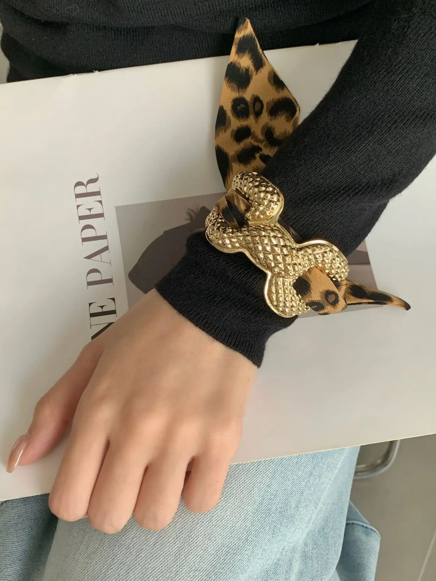 An open snake and leopard print ribbon bracelet with an exaggerated personalitys women
An open snake and leopard print ribbon bracelet with an exaggerated personalitys women