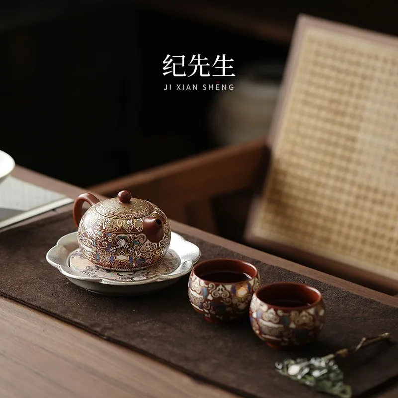 Dunhuang Gilded Silver Purple Clay Phoenix Roaring, Xishi Pot, Kung Fu Tea Set As A Gift For Customers And Friends
Dunhuang Gilded Silver Purple Clay Phoenix Roaring, Xishi Pot, Kung Fu Tea Set As A Gift For Customers And Friends