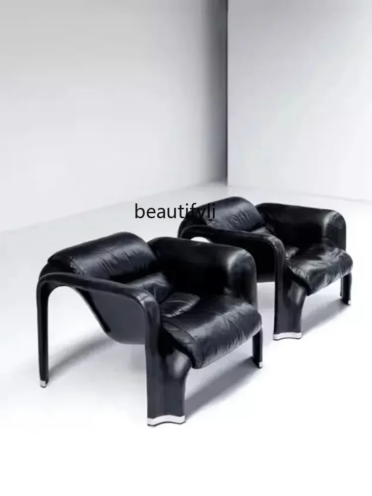 Дизайнерское кресло в стиле Mid-Century Minimalist: легкое, роскошное, с высокой спинкой, для отдыха, в скандинавском стиле, из стеклопластика, одноместное.
Дизайнерское кресло в стиле Mid-Century Minimalist: легкое, роскошное, с высокой спинкой, для отдыха, в скандинавском стиле, из стеклопластика, одноместное.