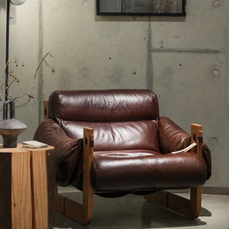 Retro medieval single solid wood living room designer casual leather recliner sofa
Retro medieval single solid wood living room designer casual leather recliner sofa