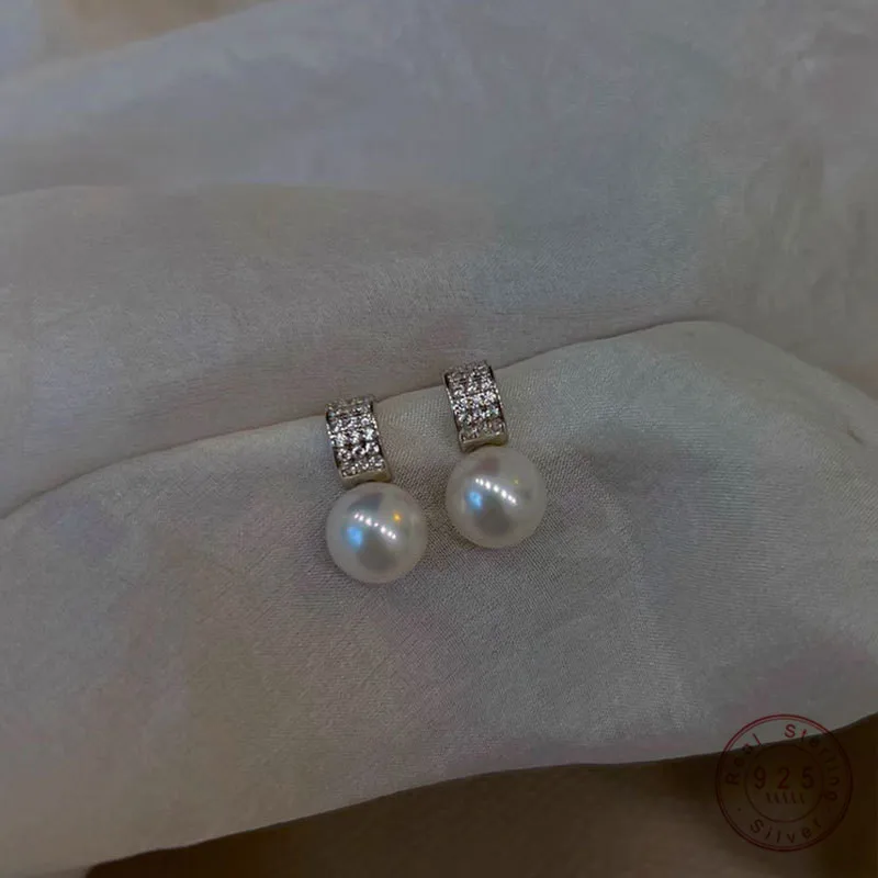 Girls 925 Sterling Silver French Temperament Geometric CZ Pearl Stud Earrings For Women Girls Wedding Party Jewelry
Girls 925 Sterling Silver French Temperament Geometric CZ Pearl Stud Earrings For Women Girls Wedding Party Jewelry