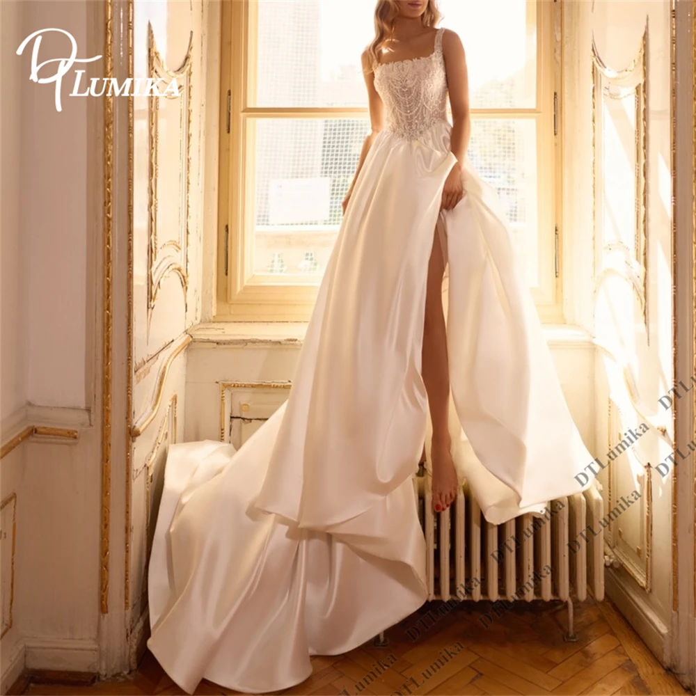 DTLumika Luxury Pearls A Line Wedding Dress for Bride 2026 Square Neckline Beaded Satin Bride Dresses Customized Bridal Gown
DTLumika Luxury Pearls A Line Wedding Dress for Bride 2026 Square Neckline Beaded Satin Bride Dresses Customized Bridal Gown