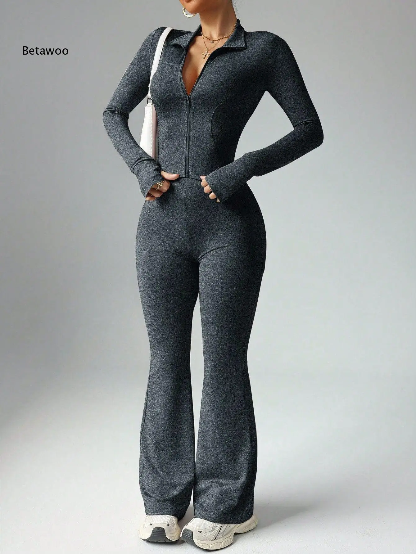 Women's 2 Piece Tracksuit Zip Up Long Sleeve Crop Jacket & High Waist Flared Pants Set
Women's 2 Piece Tracksuit Zip Up Long Sleeve Crop Jacket & High Waist Flared Pants Set