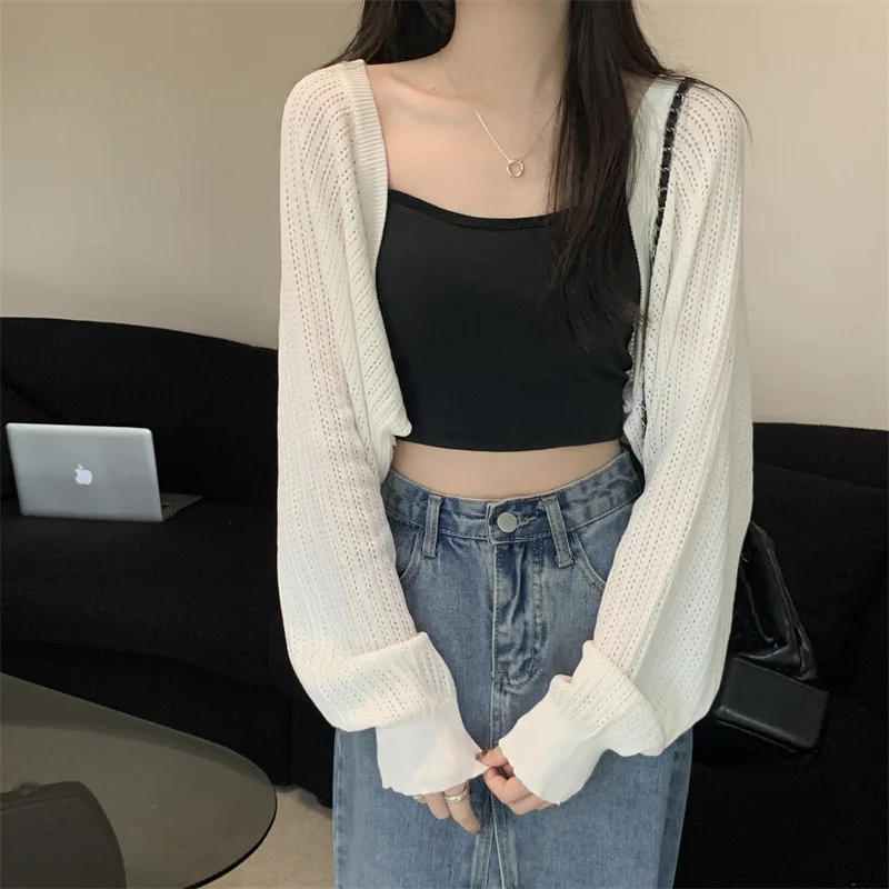 Summer thin loose solid color knitted sweater women's new short style sun protection hollow out cover sweater shawl top
Summer thin loose solid color knitted sweater women's new short style sun protection hollow out cover sweater shawl top