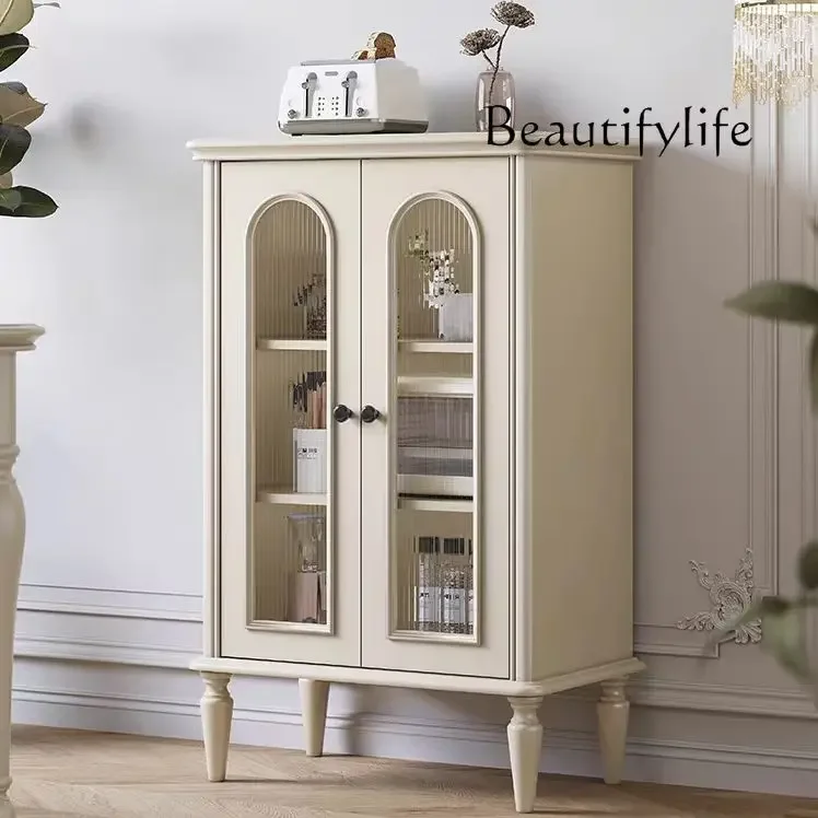 American light luxury dining edge glass tea cabinet French cream style living room storage solid wood locker
American light luxury dining edge glass tea cabinet French cream style living room storage solid wood locker